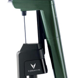 Coravin wine preservation tool in green and black, featuring a handle and needle for accessing bottles without cork removal.