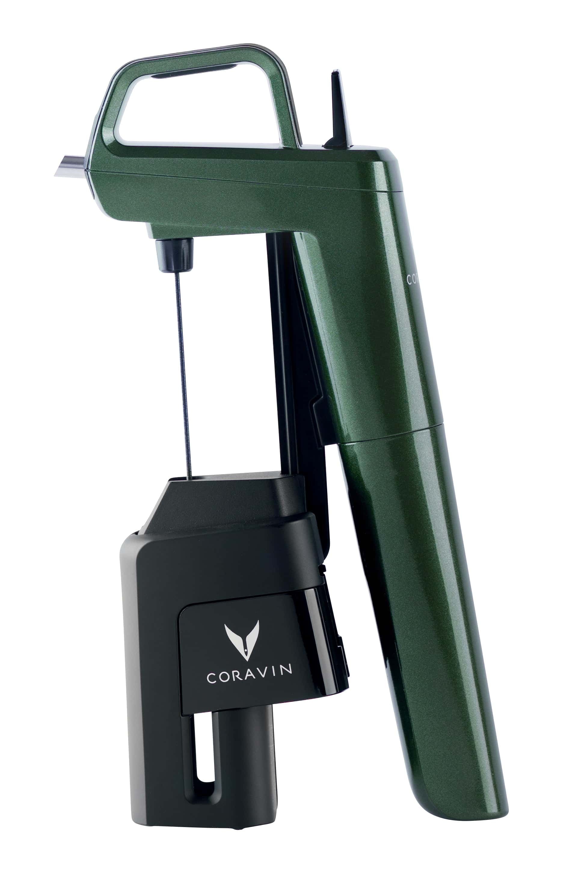 Coravin wine preservation tool in green and black, featuring a handle and needle for accessing bottles without cork removal.